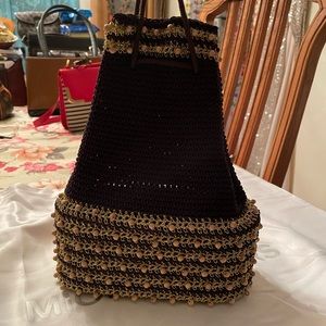 Purple and sequenced handbag